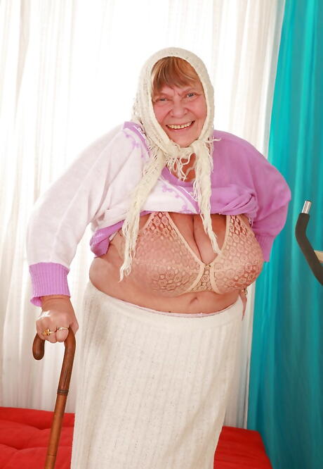 Curious granny Sara G in sexy posing gallery